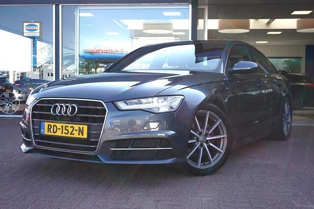 Grijs Gebruikt 2017 Audi A6 S-Line Sedan | € 21.950 (Eerlijke prijs) - Afbeelding 1/4