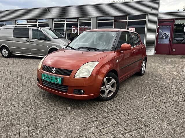 Oranje Gebruikt 2006 Suzuki Swift Hatchback | € 2.998 (Eerlijke prijs) - Afbeelding 1/4