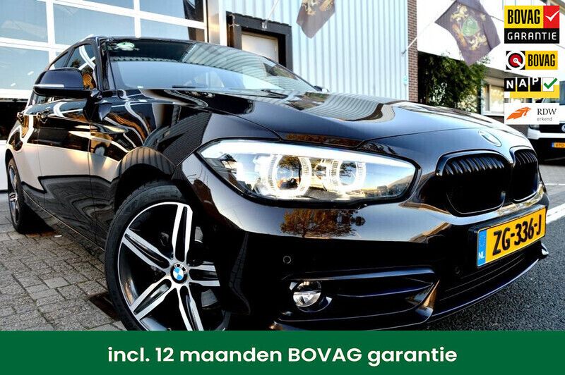 Bruin Gebruikt 2019 BMW 118 Sport Line Hatchback | € 19.950 (Goede deal) - Afbeelding 1/4