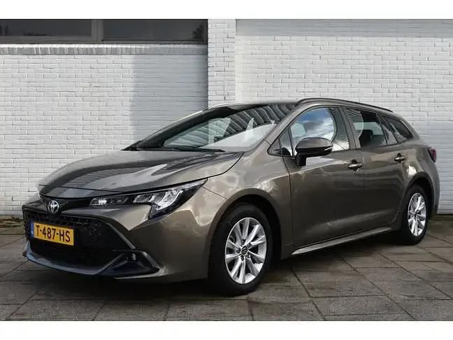 Bruin Gebruikt 2023 Toyota Corolla Active Stationwagen | € 24.999 (Eerlijke prijs) - Afbeelding 1/4