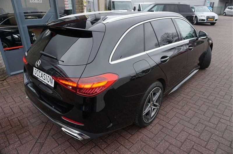 Occasion Mercedes C300e AMG line 2022 Zwart Stationwagen