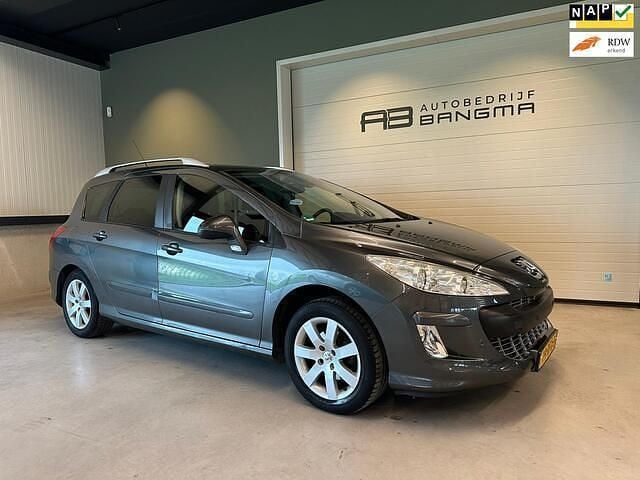 Grijs (metallic) Occasion 2011 Peugeot 308 SW Stationwagen | € 3.999 (Goede deal) - Afbeelding 1/4