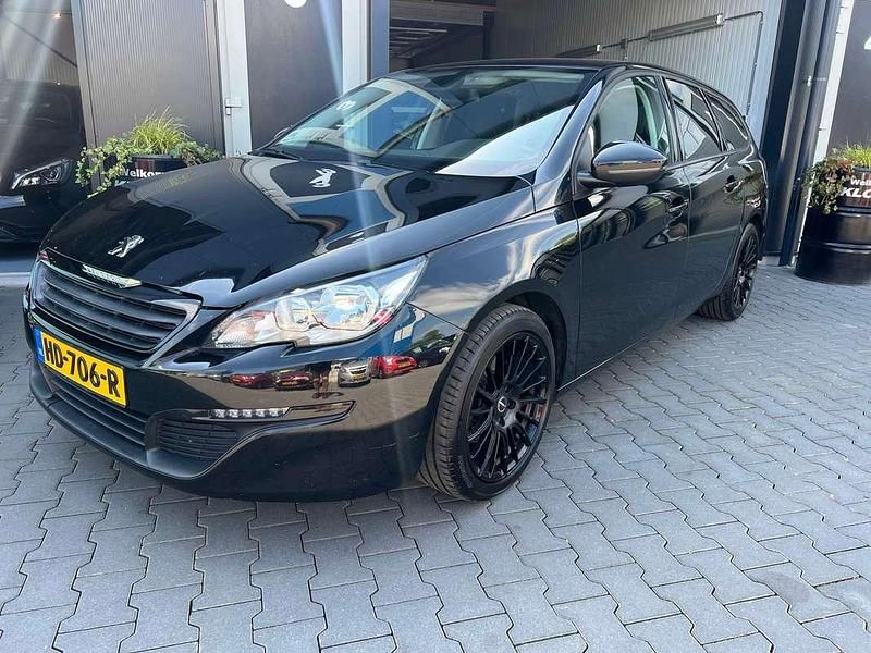 Zwart, metallic lak Gebruikt 2015 Peugeot 308 Stationwagen | € 4.499 (Goede deal) - Afbeelding 1/4