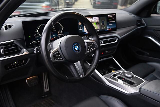 Occasion BMW 330 Basis 109 PK (80 kW) 2023 Zwart Stationwagen