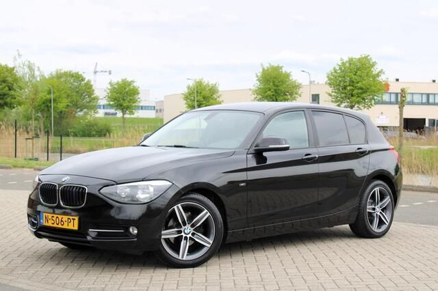 Zwart Gebruikt 2011 BMW 116 Hatchback | € 8.950 (Eerlijke prijs) - Afbeelding 1/4