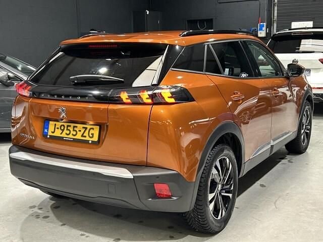 Occasion Peugeot e-2008 Allure 100 kW (136 PK) 2020 Oranje (metallic) SUV