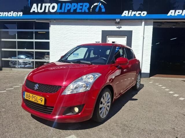 Rood Gebruikt 2011 Suzuki Swift Exclusive Hatchback | € 5.750 (Eerlijke prijs) - Afbeelding 1/4