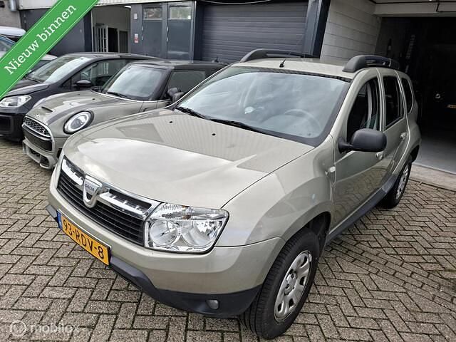 Grijs Gebruikt 2011 Dacia Duster SUV | € 6.499 (Eerlijke prijs) - Afbeelding 1/4