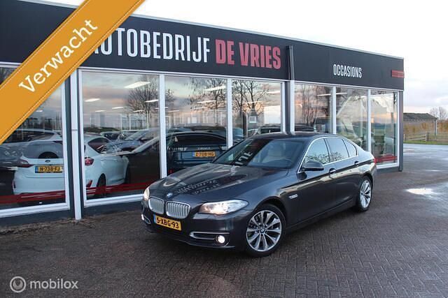 Grijs Occasion 2014 BMW 520 Luxury Line Sedan | € 14.450 (Goede deal) - Afbeelding 1/4