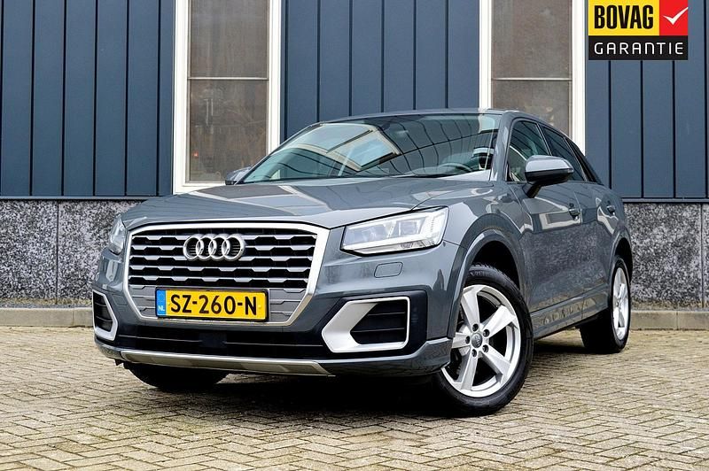 Grijs Gebruikt 2017 Audi Q2 Sport SUV | € 17.950 (Iets duurder) - Afbeelding 1/4