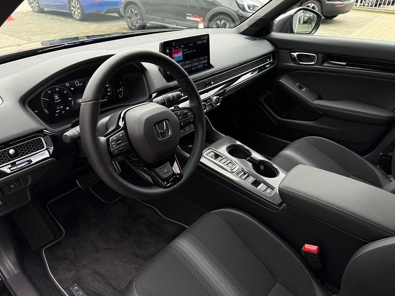 Nieuw Honda Civic Hybrid 143 PK (105 kW) 2026 Zwart Hatchback