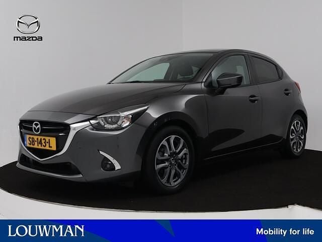 Machine grey (grijs metallic) Gebruikt 2018 Mazda 2 Luxury Hatchback | € 17.395 (Eerlijke prijs) - Afbeelding 1/4