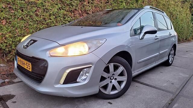 Occasion Peugeot 308 SW 114 PK (83 kW) 2013 Grijs Stationwagen