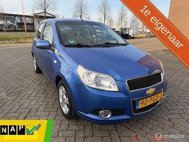 Blauw Occasion 2011 Chevrolet Aveo LS Hatchback | € 2.999 (Eerlijke prijs) - Afbeelding 1/4