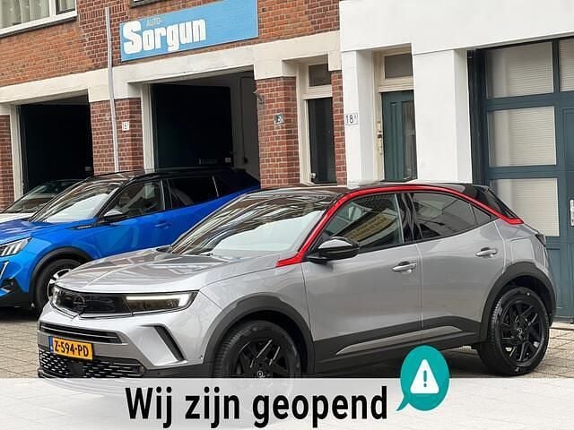 Grijs Gebruikt 2022 Opel Mokka GS Line SUV | € 18.950 (Goede deal) - Afbeelding 1/4