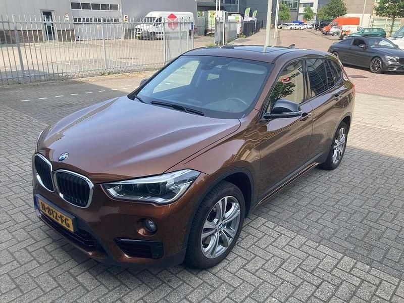 Bruin Occasion 2016 BMW X1 Executive SUV | € 19.950 (Goede deal) - Afbeelding 1/4