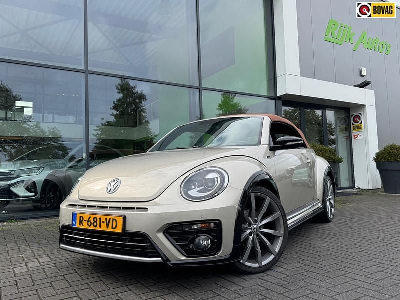 Bruin Gebruikt 2015 VW Beetle R-line Cabriolet | € 19.945 - Afbeelding 1/4