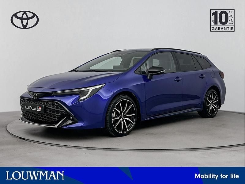 Blauw Gebruikt 2023 Toyota Corolla Hybrid Sport Stationwagen | € 32.250 - Afbeelding 1/3