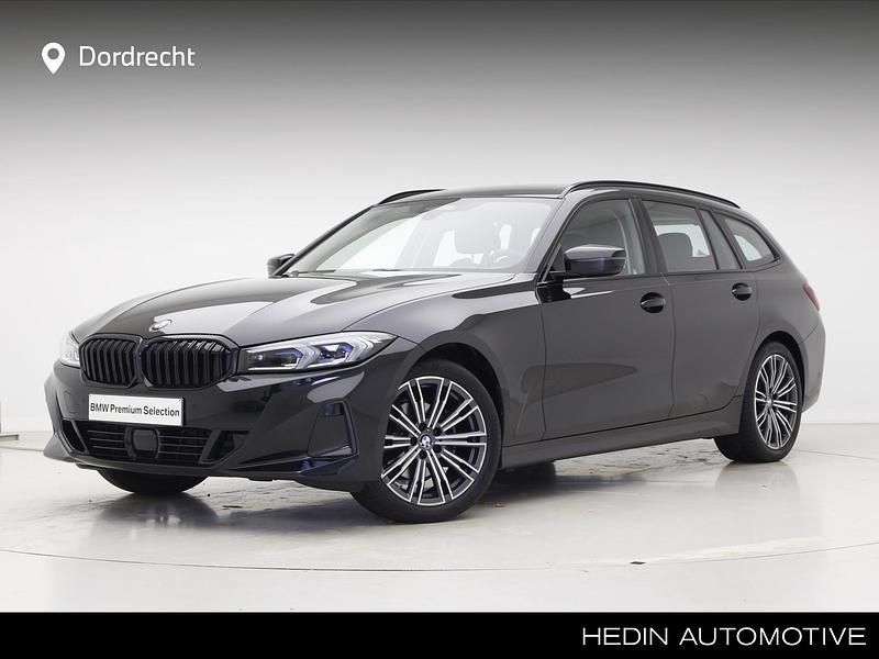 Zwart Gebruikt 2024 BMW 320 Comfort Edition Stationwagen | € 49.895 - Afbeelding 1/4