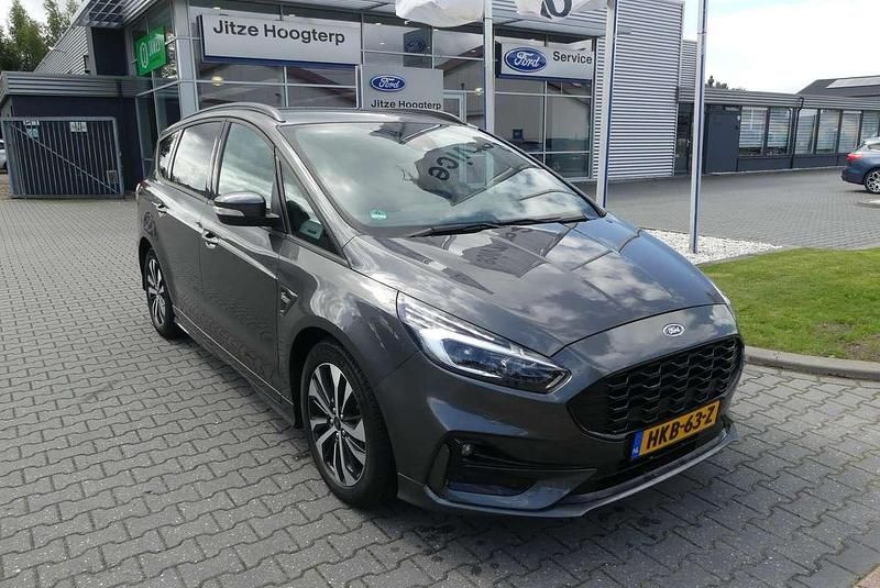 , metallic lak Gebruikt 2023 Ford S-MAX S MPV | € 38.895 (Eerlijke prijs) - Afbeelding 1/4