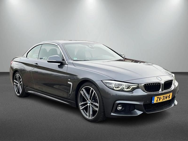 Grijs (metallic) Occasion 2018 BMW 420 Executive Cabriolet | € 31.401 (Iets duurder) - Afbeelding 1/4
