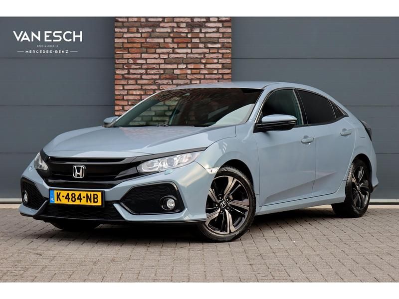 Grijs Occasion 2021 Honda Civic Elegance Hatchback | € 14.500 (Goede deal) - Afbeelding 1/4