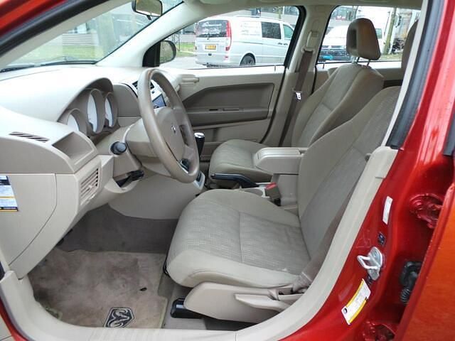 Occasion Dodge Caliber SE 150 PK (110 kW) 2006 Oranje Hatchback