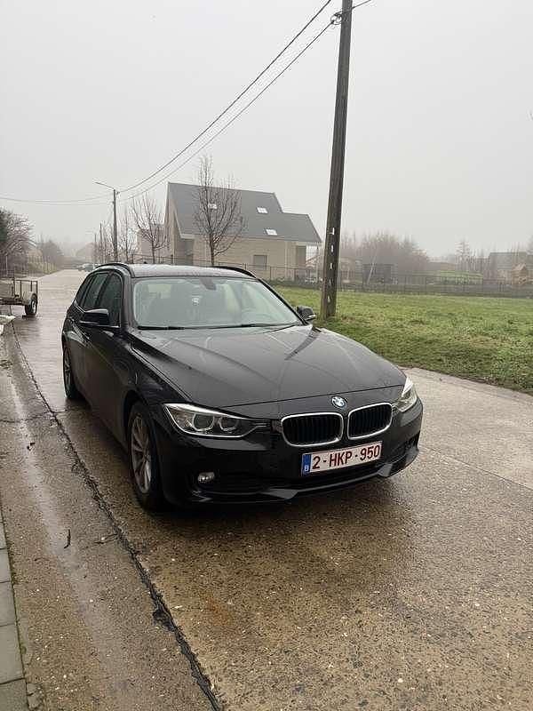 Occasion 2014 BMW 320 Sport Line Stationwagen | € 9.950 (Eerlijke prijs) - Afbeelding 1/4