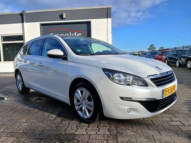 Wit Occasion 2014 Peugeot 308 SW Stationwagen | € 4.999 (Eerlijke prijs) - Afbeelding 1/4