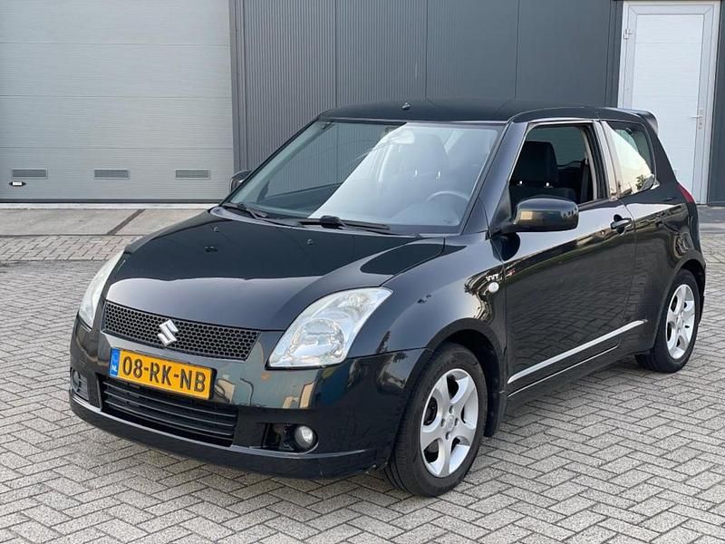 Zwart Gebruikt 2005 Suzuki Swift Exclusive Hatchback | € 1.950 - Afbeelding 1/4