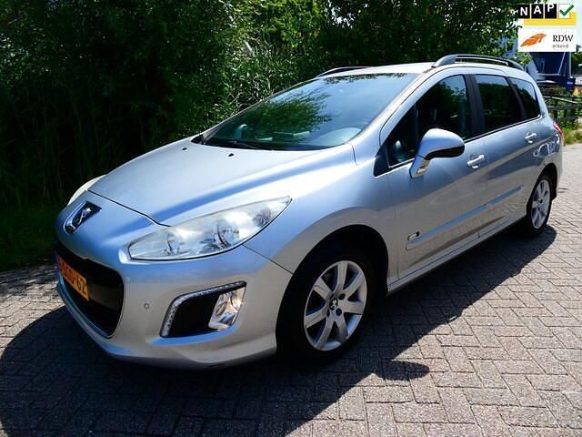 Grijs Gebruikt 2013 Peugeot 308 Style Stationwagen | € 4.895 (Eerlijke prijs) - Afbeelding 1/4