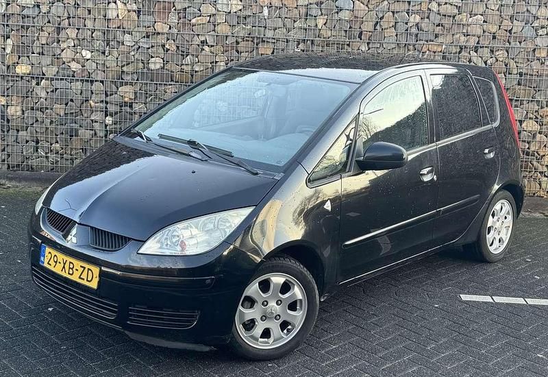 Zwart Gebruikt 2007 Mitsubishi Colt Invite Stationwagen | € 995 (Goede deal) - Afbeelding 1/4