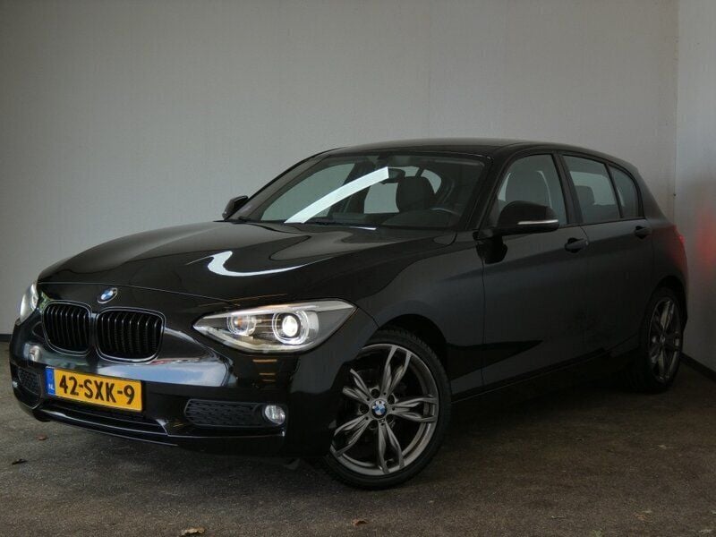Zwart Gebruikt 2012 BMW 116 Hatchback | € 7.450 (Eerlijke prijs) - Afbeelding 1/4