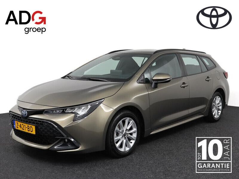 Groen Gebruikt 2024 Toyota Corolla Hybrid Active Stationwagen | € 28.400 - Afbeelding 1/4