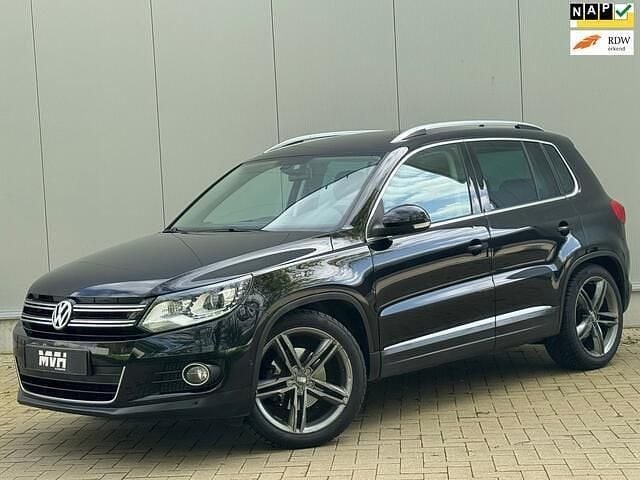 Zwart Gebruikt 2012 VW Tiguan Sport SUV | € 11.450 (Goede deal) - Afbeelding 1/4