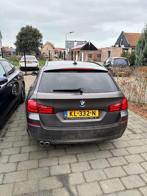 Bruin Occasion 2012 BMW 530 Executive Stationwagen | € 7.750 (Super prijs) - Afbeelding 1/4