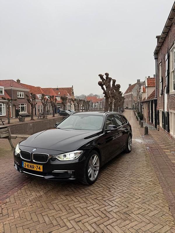 Occasion 2013 BMW 320 Luxury Line Stationwagen | € 7.750 (Iets duurder) - Afbeelding 1/4