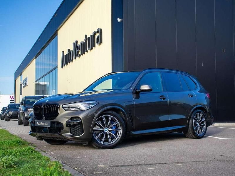 Groen (metallic) Occasion 2022 BMW X5 Executive SUV | € 68.950 (Eerlijke prijs) - Afbeelding 1/4