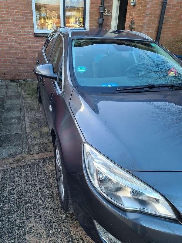 Occasion Opel Astra Cosmo 101 PK (74 kW) 2011 Grijs Stationwagen