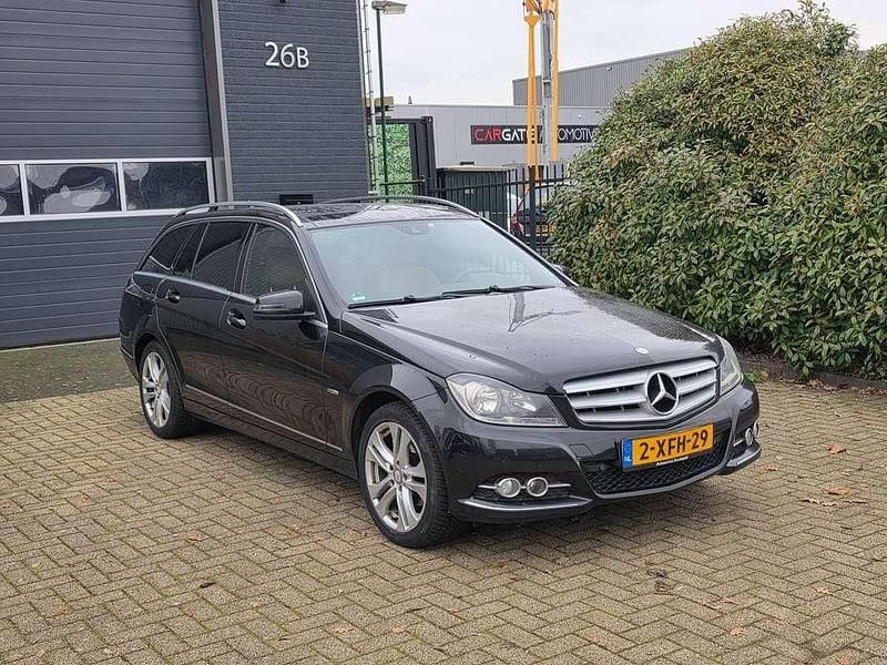 Zwart Occasion 2011 Mercedes C200 Stationwagen | € 4.500 - Afbeelding 1/4