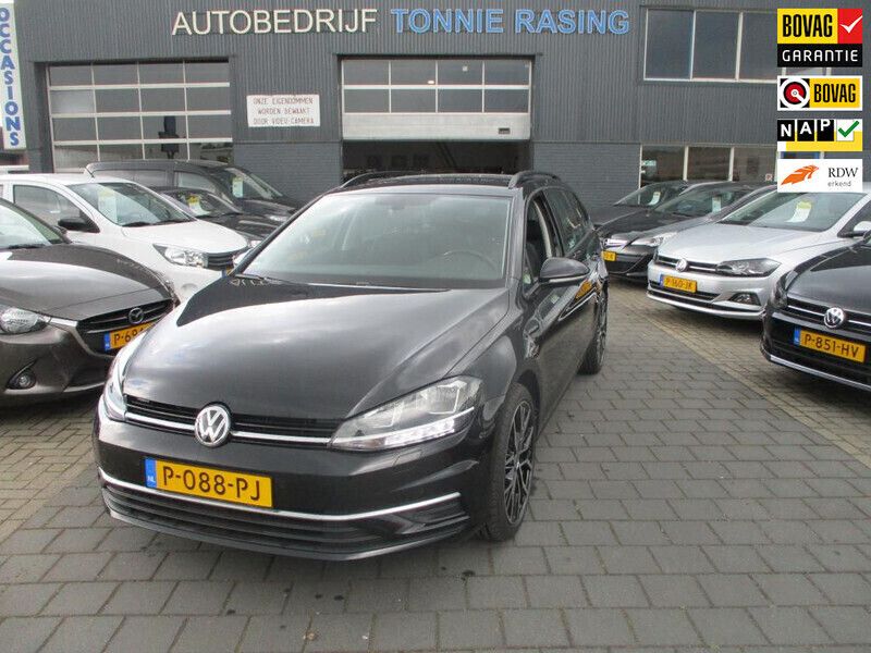 Zwart, metallic lak Gebruikt 2018 VW Golf VII Comfortline Stationwagen | € 14.740 (Iets duurder) - Afbeelding 1/4