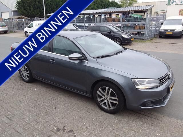 Grijs Gebruikt 2012 VW Jetta Highline Sedan | € 7.650 (Eerlijke prijs) - Afbeelding 1/4