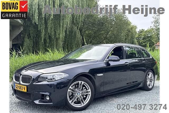 Zwart, metallic lak Gebruikt 2015 BMW 520 Executive Stationwagen | € 18.445 (Iets duurder) - Afbeelding 1/4