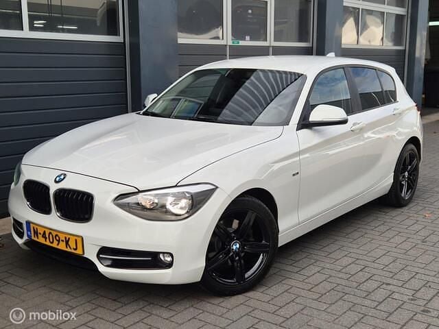 Wit Gebruikt 2013 BMW 118 Executive Hatchback | € 9.950 (Eerlijke prijs) - Afbeelding 1/4
