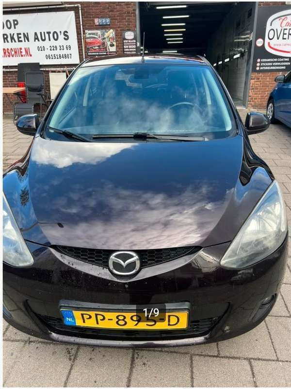Bruin, metallic lak Gebruikt 2008 Mazda 2 Touring Hatchback | € 1.995 (Eerlijke prijs) - Afbeelding 1/4