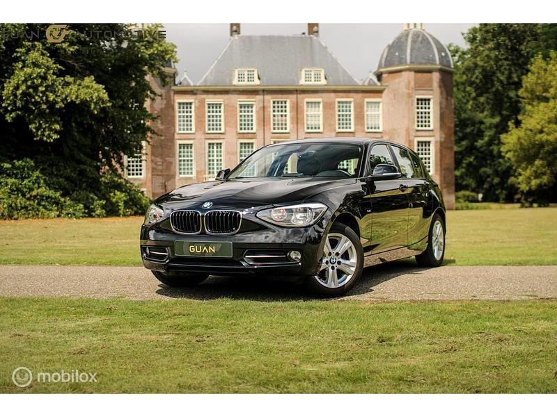 Zwart Gebruikt 2013 BMW 116 Executive Hatchback | € 6.499 (Super prijs) - Afbeelding 1/4