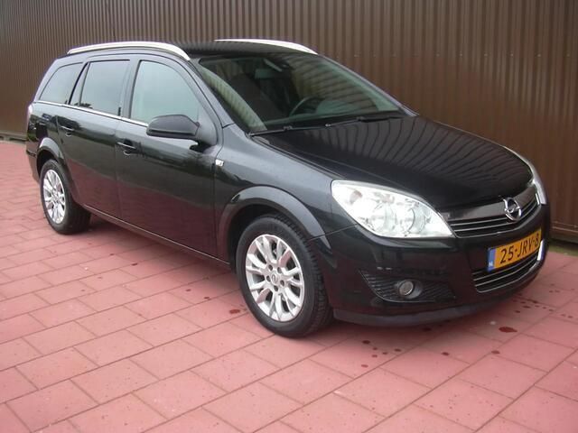 Zwart Gebruikt 2009 Opel Astra Cosmo Stationwagen | € 2.650 (Eerlijke prijs) - Afbeelding 1/4