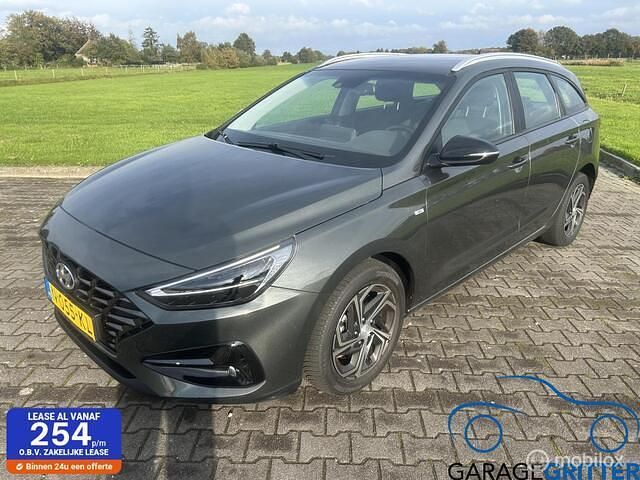 Grijs Gebruikt 2021 Hyundai i30 Comfort Stationwagen | € 17.750 (Eerlijke prijs) - Afbeelding 1/4