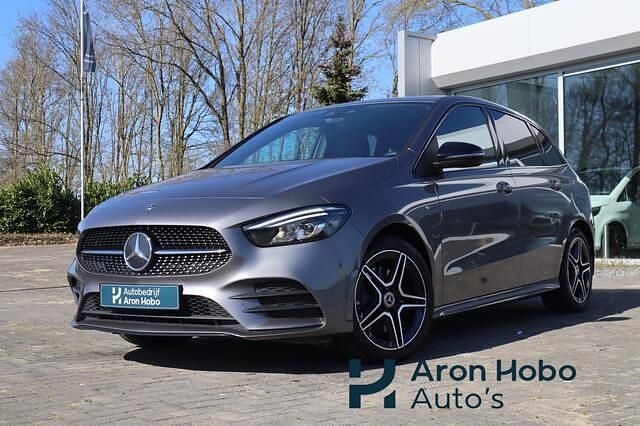Grijs Gebruikt 2021 Mercedes E250 AMG MPV | € 27.950 (Eerlijke prijs) - Afbeelding 1/4