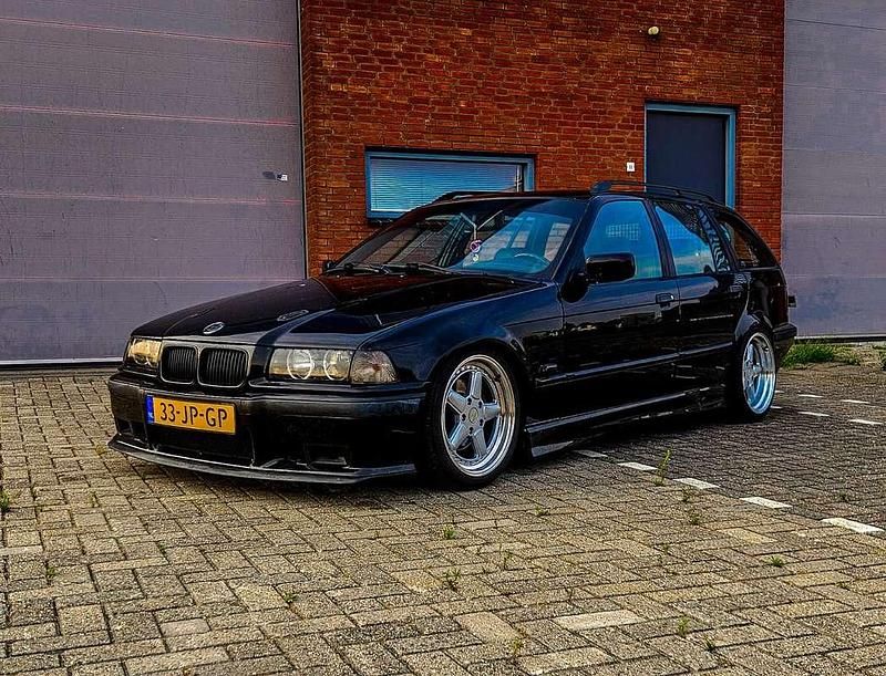 Zwart Gebruikt 1996 BMW 328 M Sport Stationwagen | € 8.750 - Afbeelding 1/4
